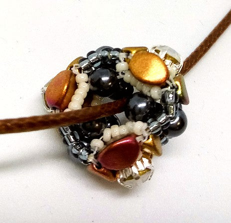 Close up of beaded bead